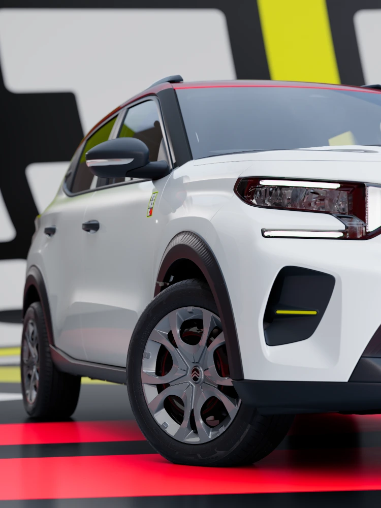 Dreiviertel-Detailansicht von vorne des Citroën ë-C3 TONIC Limited Edition Elektro-Stadtauto mit Raddesign und Schutzverkleidung, smarte E-Fahrzeug Alternative