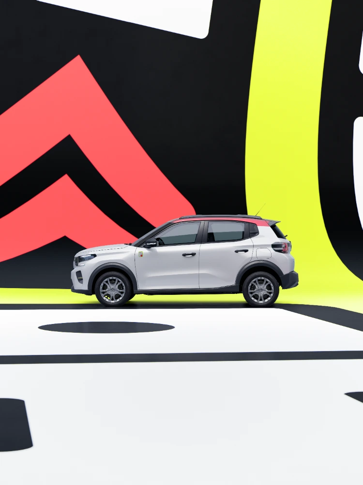 Seitenprofilansicht des Citroën ë-C3 TONIC Limited Edition Elektro-Stadtauto im Studioumfeld, kompaktes Design, smarte E-Fahrzeug Alternative